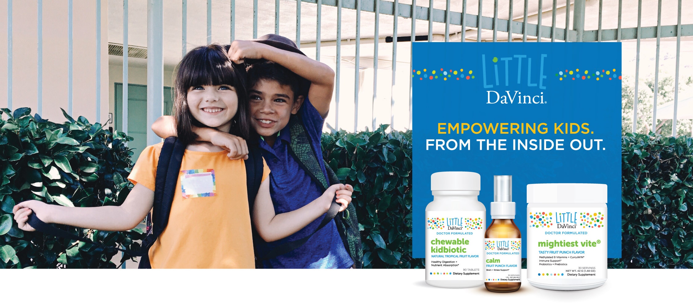 Children behind bottles of Little DaVinci supplements